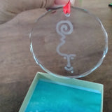 Alutiiq petroglyph etched glass ornament